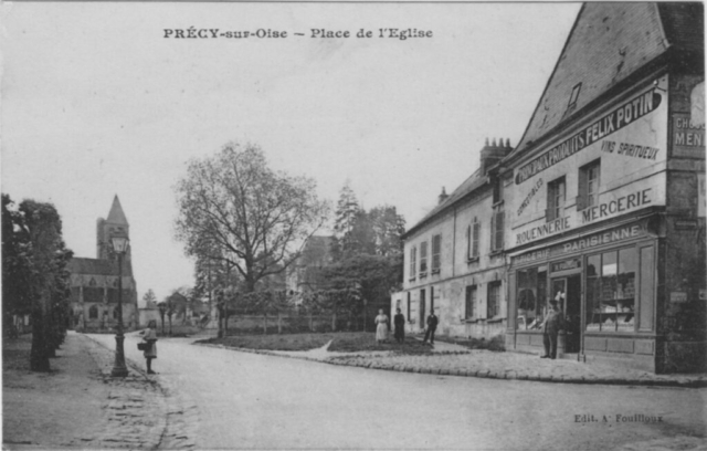 La place de l'église à Précy